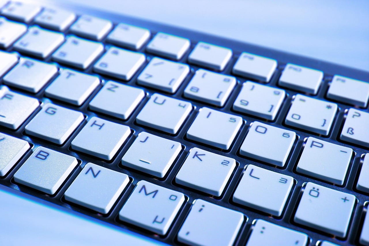 Full-size arrow keys, a fingerprint reader in the power button and no wasted space.