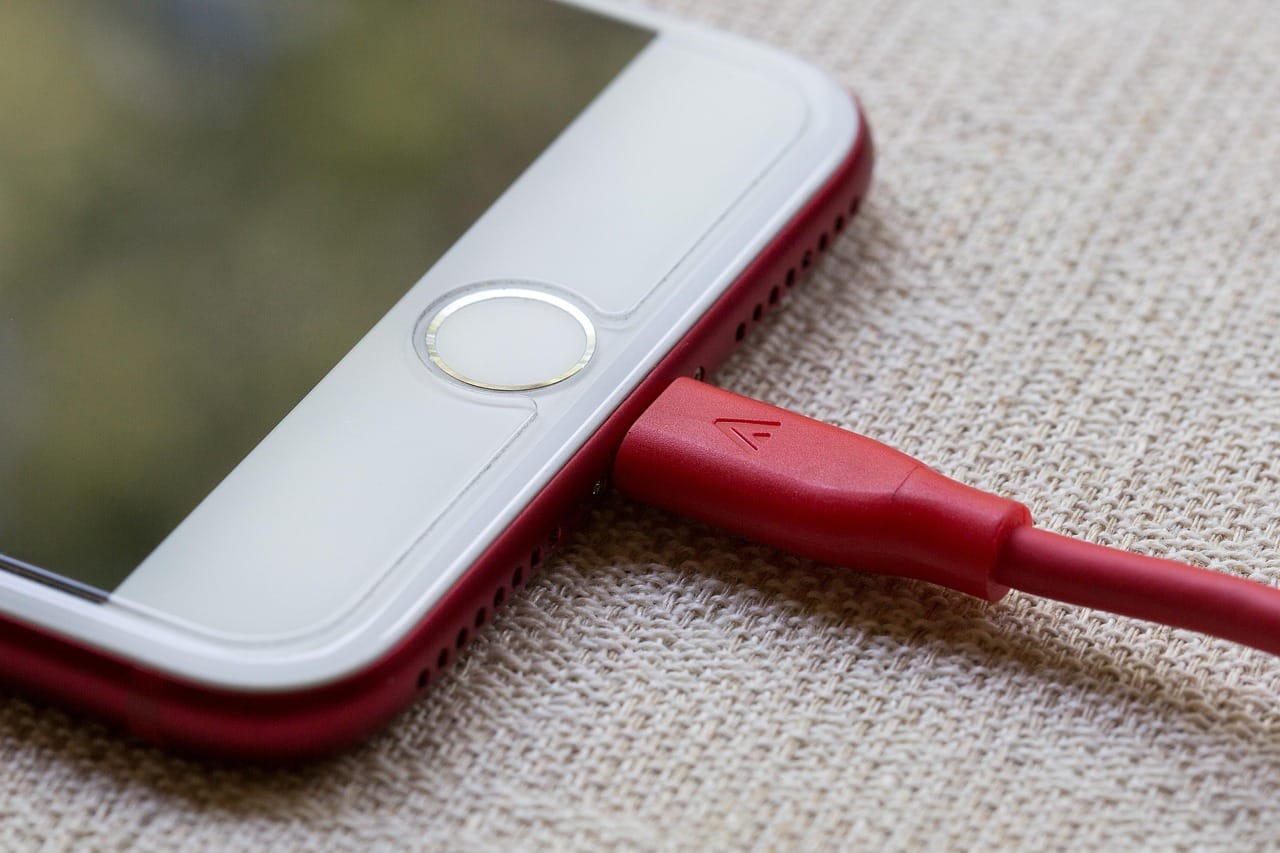 The 65 W charger is in the box. A full charge takes 38 minutes.